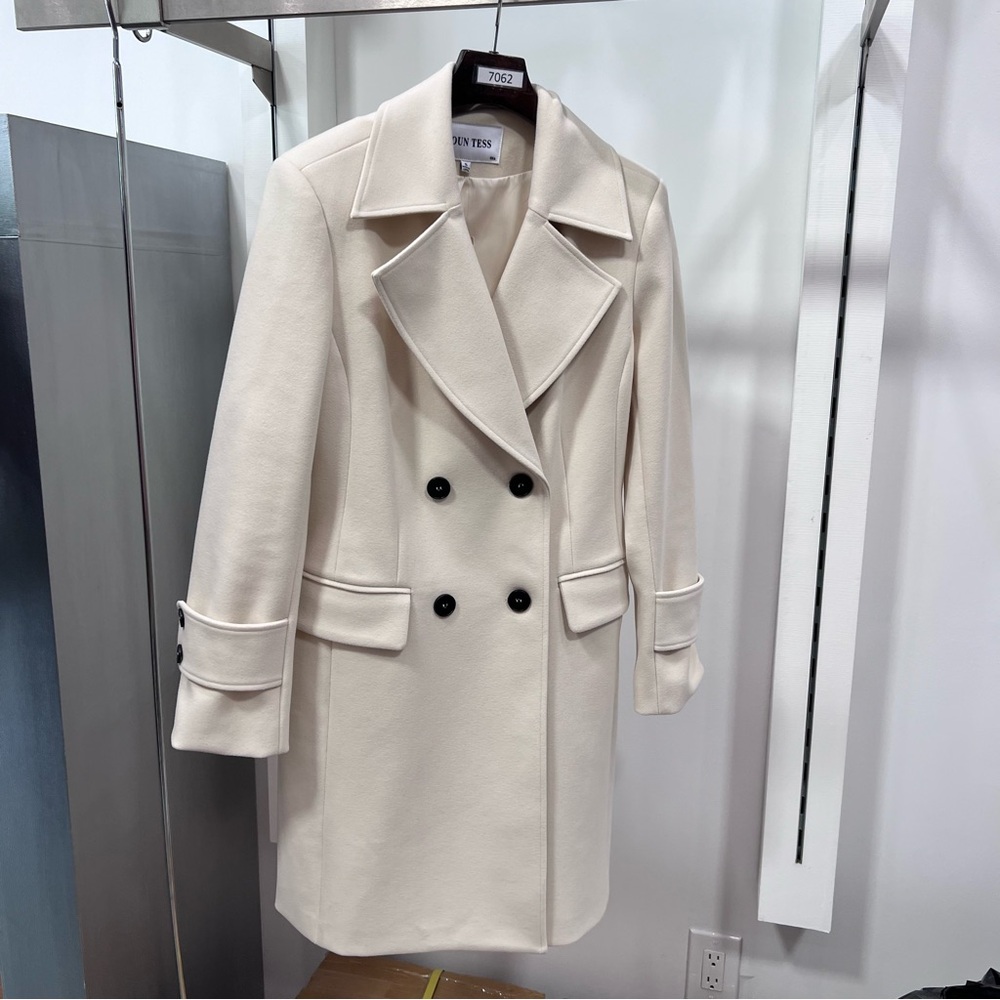 Women's Double-Breasted Coat. Color: Ivory 
Sizes Available: Small